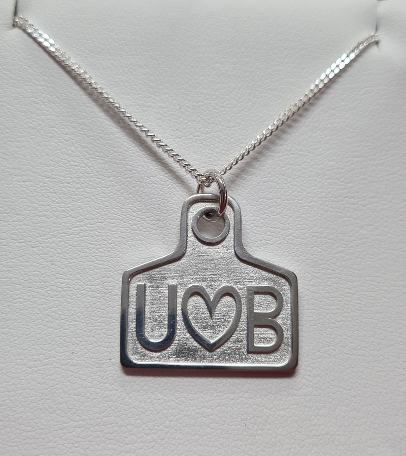 BRAND STERLING SILVER PENDANT - EAR TAG STYLE