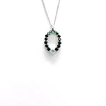 STERLING SILVER PENDANT SET WITH GREEN AND WHITE CUBIC ZIRCONIA